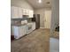 Well-lit kitchen featuring granite countertops, stainless steel appliances, and white cabinets at 109 Dovetail Cir, Summerville, SC 29483