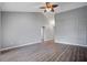 This spacious living room features wood-look floors and a built-in accent wall at 109 Dovetail Cir, Summerville, SC 29483