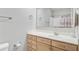 Bathroom with wooden vanity, soft-close cabinets and drawers, and ample counter space at 1111 Basildon Rd, Mount Pleasant, SC 29466