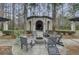 Outdoor fire pit with comfortable seating and a beautiful pergola in a community recreational area at 1111 Basildon Rd, Mount Pleasant, SC 29466