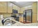 Efficient kitchen with stainless steel appliances, granite counters, and ample cabinet space, designed for convenience at 1111 Basildon Rd, Mount Pleasant, SC 29466