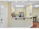Open kitchen with a breakfast bar, granite countertops, and stainless steel appliances, perfect for entertaining at 1111 Basildon Rd, Mount Pleasant, SC 29466