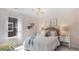 Charming bedroom with a cozy bed, stylish wallpaper, and bright natural light at 113 Moscato Ln, Summerville, SC 29485