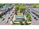 Aerial view of a charming downtown square featuring a green space, gazebo, and quaint shops along a tree-lined street at 1130 Plantation Overlook Dr, Moncks Corner, SC 29461