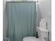 Clean bathroom featuring a toilet, modern accessories, and a stylish shower curtain at 1130 Plantation Overlook Dr, Moncks Corner, SC 29461