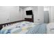 Comfortable bedroom with dresser and television, with an ensuite bathroom at 1130 Plantation Overlook Dr, Moncks Corner, SC 29461