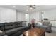 Large bonus room with comfortable furniture, a wet bar, and lots of natural light at 1130 Plantation Overlook Dr, Moncks Corner, SC 29461