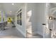 Inviting front porch of a home with elegant details, featuring cozy seating and classic architectural elements at 1130 Plantation Overlook Dr, Moncks Corner, SC 29461