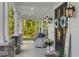 Charming front porch with comfortable seating, decorative wreaths, and inviting decor at 1130 Plantation Overlook Dr, Moncks Corner, SC 29461
