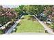 Scenic aerial view of a green space with benches, trees and plantings, perfect for relaxing and enjoying the outdoors at 1130 Plantation Overlook Dr, Moncks Corner, SC 29461