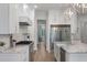 Spacious kitchen featuring stainless steel appliances, marble countertops, and open access to other living spaces at 1130 Plantation Overlook Dr, Moncks Corner, SC 29461