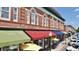 Charming storefronts with colorful awnings line the street, offering a delightful shopping and dining experience at 1130 Plantation Overlook Dr, Moncks Corner, SC 29461