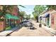 Charming street view featuring boutique shops and outdoor seating areas, inviting exploration and relaxation at 1130 Plantation Overlook Dr, Moncks Corner, SC 29461