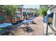 Charming downtown streetscape with outdoor seating under blue umbrellas, perfect for enjoying a sunny day at 1130 Plantation Overlook Dr, Moncks Corner, SC 29461