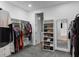 Spacious walk-in closet with shelves and rods for shoes and hanging clothes at 1130 Plantation Overlook Dr, Moncks Corner, SC 29461