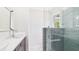 The bathroom features a stylish glass shower and double vanity at 1225 Dennis Blvd, Moncks Corner, SC 29461