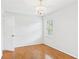This bedroom is spacious and bright with a charming chandelier at 1225 Dennis Blvd, Moncks Corner, SC 29461