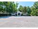 Charming clubhouse with well-maintained landscaping and ample parking, providing a community hub for gatherings at 143 Dorothy Dr, Charleston, SC 29414