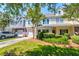 Townhome exterior with beautiful landscaping, driveway and garage at 143 Dorothy Dr, Charleston, SC 29414