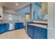 An open concept kitchen that features painted cabinetry and tile flooring at 143 Dorothy Dr, Charleston, SC 29414