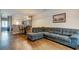 Cozy living room area, showing a sectional sofa, dining table, and kitchen at 143 Dorothy Dr, Charleston, SC 29414