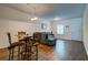 Cozy living room area, showing a sectional sofa, dining table at 143 Dorothy Dr, Charleston, SC 29414