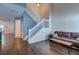 Spacious living area featuring hardwood floors and staircase at 143 Dorothy Dr, Charleston, SC 29414