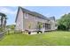 This home features a manicured lawn, wooden fence, and screened-in porch, ideal for relaxing outdoors at 1436 Lagoon Park Cir, Mount Pleasant, SC 29466