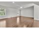 A spacious bedroom has a ceiling fan and wood floors at 1436 Lagoon Park Cir, Mount Pleasant, SC 29466