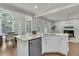 Bright, open kitchen featuring a large island, stainless appliances, and eat-in dining area at 1436 Lagoon Park Cir, Mount Pleasant, SC 29466