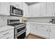 Well-appointed kitchen with stainless steel appliances, white cabinets, and modern finishes at 1436 Lagoon Park Cir, Mount Pleasant, SC 29466