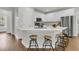 Bright kitchen featuring white cabinets, stainless steel appliances and a large center island at 1436 Lagoon Park Cir, Mount Pleasant, SC 29466