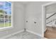 The laundry room features a window and shelves at 1436 Lagoon Park Cir, Mount Pleasant, SC 29466