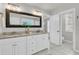 Well-lit bathroom featuring double sinks, granite countertops, and a large framed mirror, ideal for a clean, bright space at 1436 Lagoon Park Cir, Mount Pleasant, SC 29466