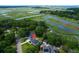 Areal shot showing home with pool and access to waterfront property at 1468 N Relyea Ave, Charleston, SC 29412
