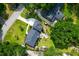 Aerial view of the property showcasing the home's layout, landscaping, and surrounding neighborhood at 1468 N Relyea Ave, Charleston, SC 29412