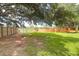 Spacious backyard with mature trees, a hammock, and plenty of room for recreation at 1468 N Relyea Ave, Charleston, SC 29412