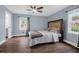 Charming bedroom with hardwood floors, large window, and neutral paint at 1468 N Relyea Ave, Charleston, SC 29412