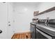 Modern laundry room featuring LG washer and dryer set with utility shelving at 1468 N Relyea Ave, Charleston, SC 29412