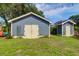 Detached outbuildings offering ample storage and workspace, set in a grassy yard at 1468 N Relyea Ave, Charleston, SC 29412