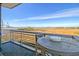 Relaxing balcony offers stunning waterfront views, ample seating, and serene outdoor space perfect for enjoying the scenery at 149 Cooper River Dr, Mount Pleasant, SC 29464