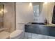 Modern bathroom featuring a sleek floating vanity, decorative lighting, and stand-up shower at 149 Cooper River Dr, Mount Pleasant, SC 29464