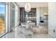 Dining area with a modern chandelier, wine storage, and bar area at 149 Cooper River Dr, Mount Pleasant, SC 29464
