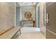 Inviting entryway with marble floors, a stylish console table and mirror for a modern elegant touch at 149 Cooper River Dr, Mount Pleasant, SC 29464