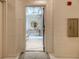 View through an apartment doorway to an elegant entryway with marble floors and stylish console table at 149 Cooper River Dr, Mount Pleasant, SC 29464