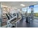 Well-equipped gym featuring treadmills and weight machines with scenic outdoor views at 149 Cooper River Dr, Mount Pleasant, SC 29464
