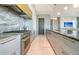 Gourmet kitchen with stainless steel appliances, a marble backsplash, and a large island at 149 Cooper River Dr, Mount Pleasant, SC 29464