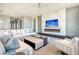 Sophisticated living room features a modern fireplace, built-in TV, comfortable seating, and stylish accent pieces at 149 Cooper River Dr, Mount Pleasant, SC 29464