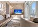 Bright, modern living room with accent wall, comfortable seating, and city views at 149 Cooper River Dr, Mount Pleasant, SC 29464