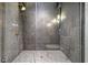 Contemporary shower with glass enclosure, gold hardware, and tiled walls at 149 Cooper River Dr, Mount Pleasant, SC 29464